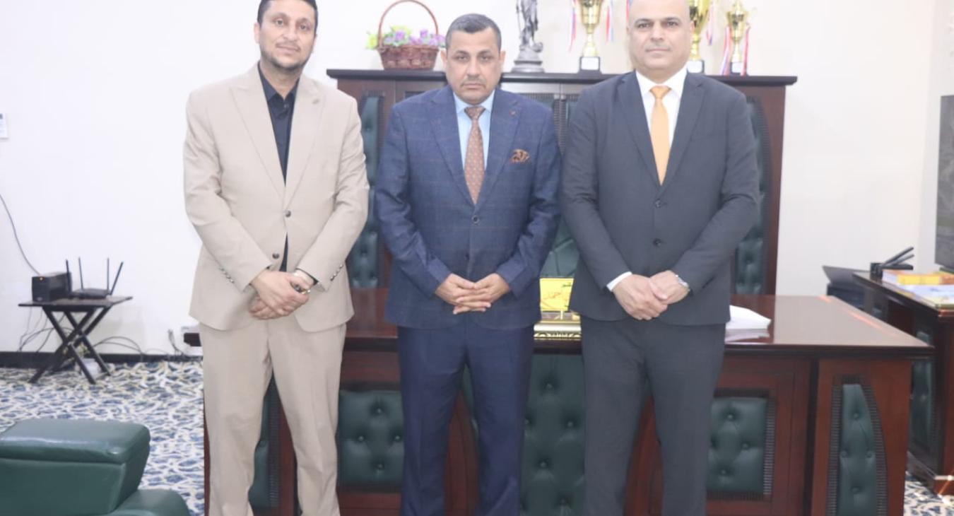 Signing a twinning agreement with the Baghdad College of Economic Sciences.